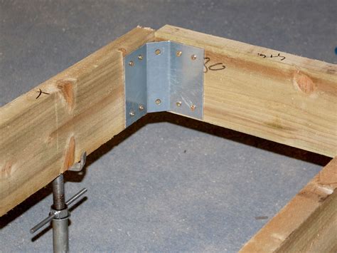 building a deck with metal support bracket|deck frame corner bracket.